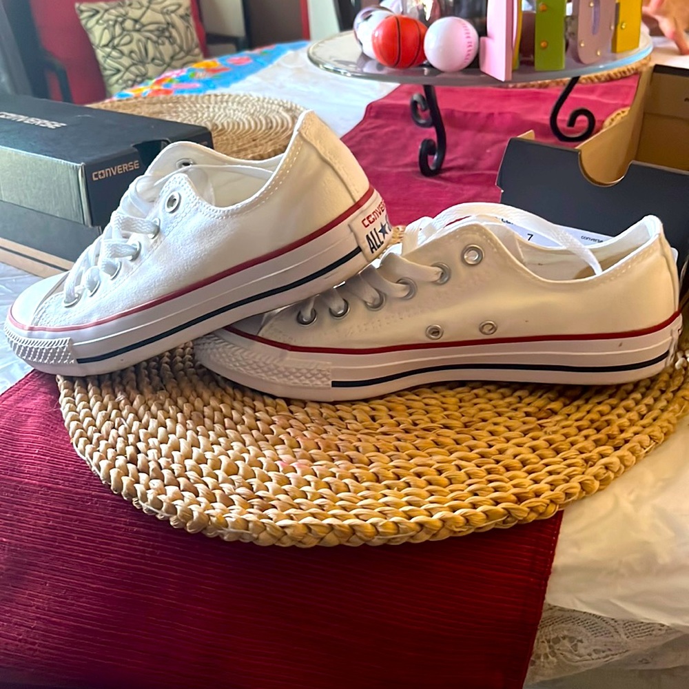 White low-top Chuck Taylors. Brand new, never worn